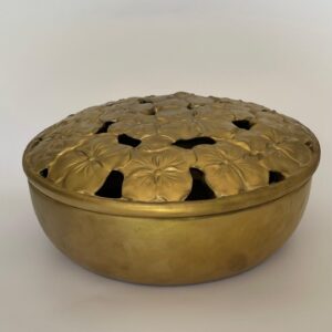 Cofre dorado redondo de porcelana